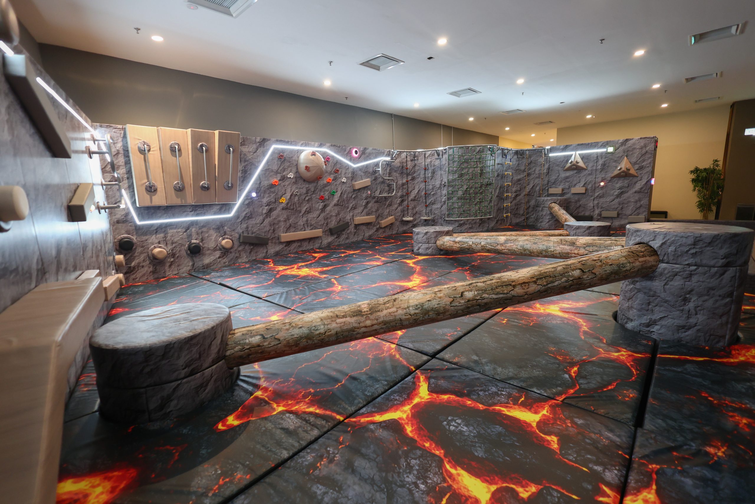 Shuriken Sprint obstacle at GAMEON Ninja Park, The Labs BBCC, Kuala Lumpur, featuring a ninja-inspired agility course with lava-themed flooring.